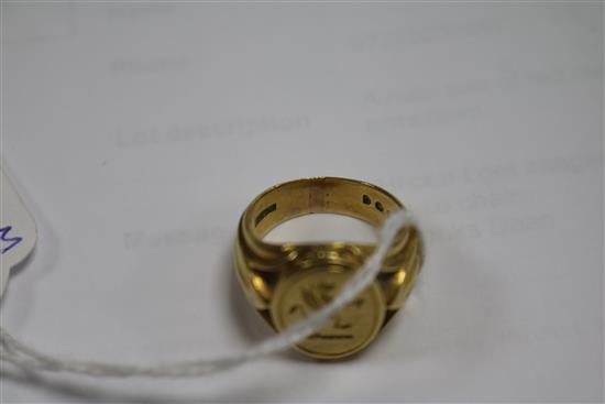 An 18ct gold signet ring with crest-engraved matrix, size N.